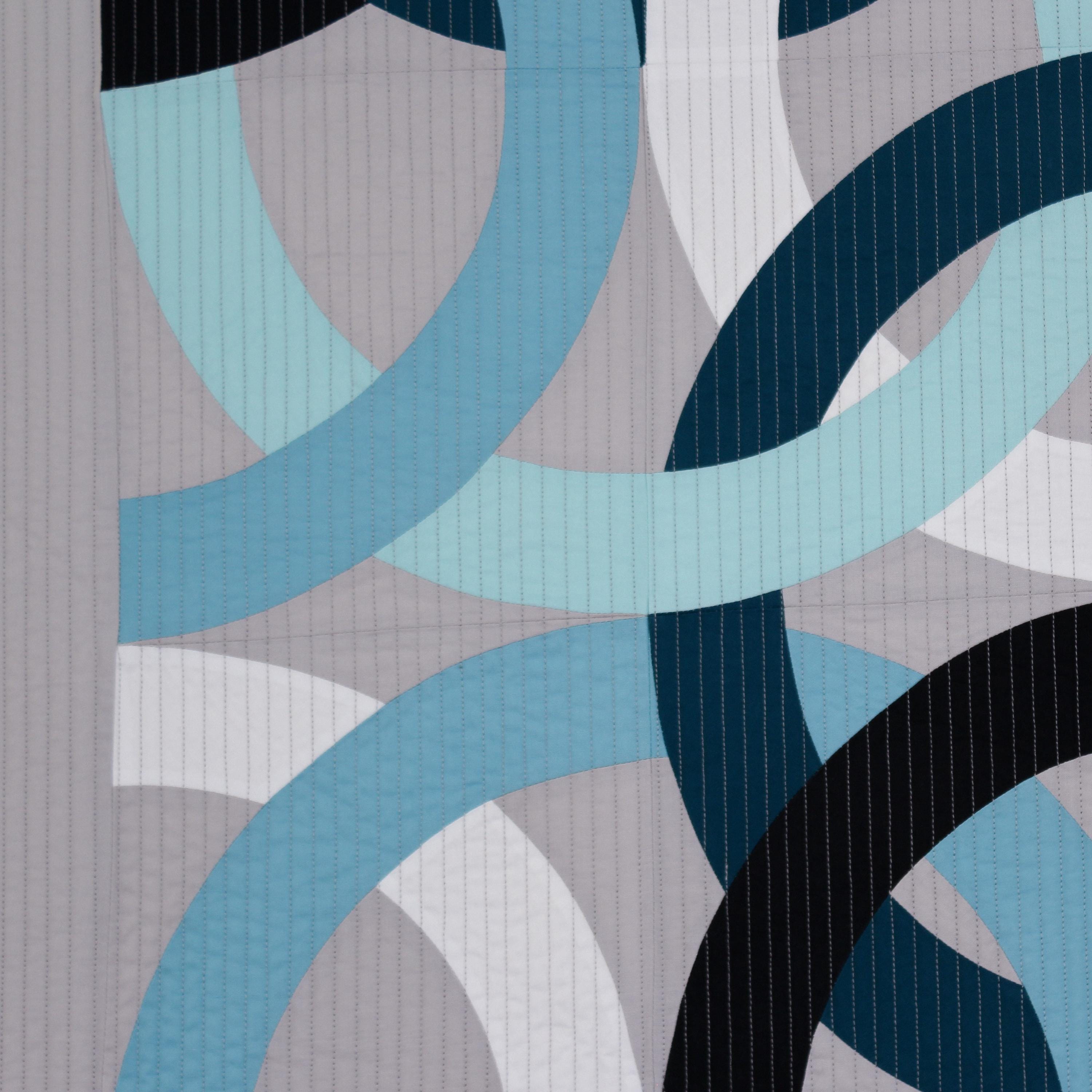 Abstract pattern with blue, black, and gray circles on a textured background